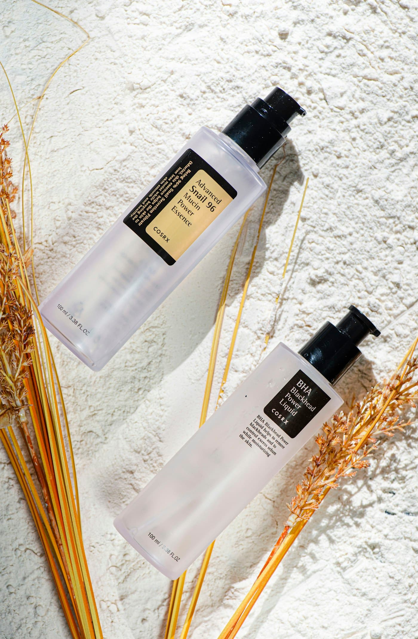 GOYO toner and essence on a soft neutral surface