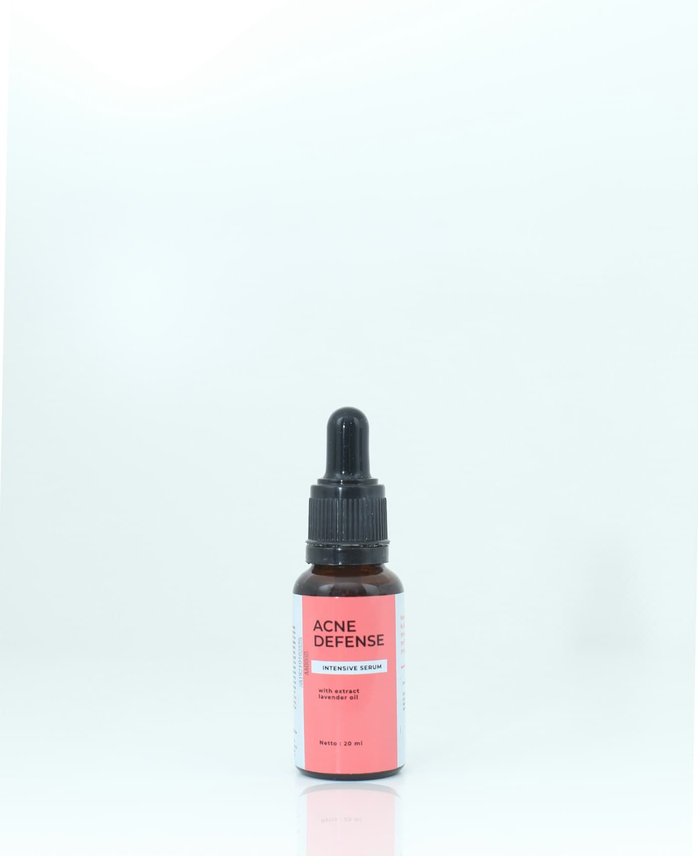 Minimal serum bottle on a soft mint surface